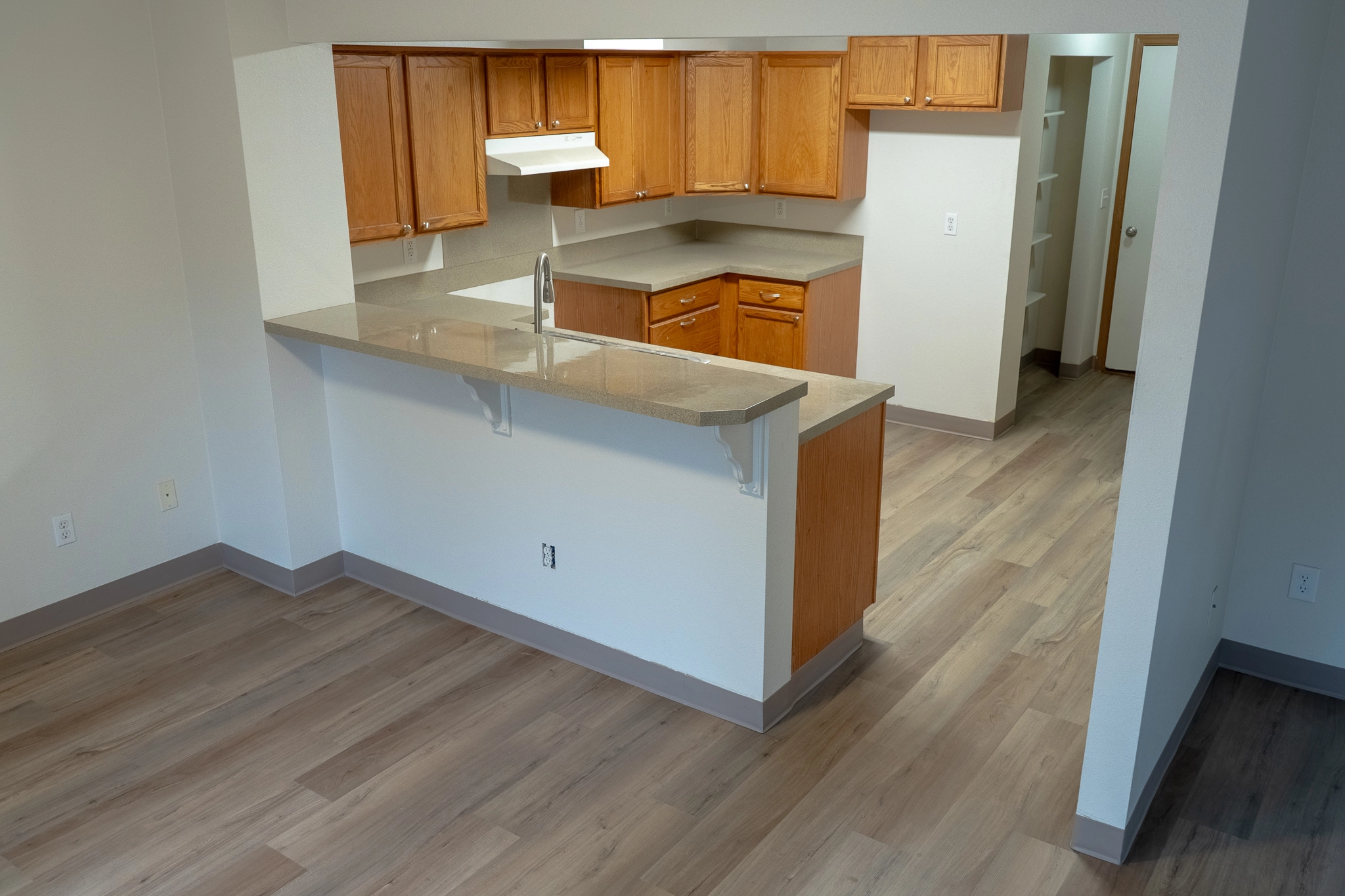 Elegant modern living room showcasing premium hardwood flooring installation by Acosta Flooring in Washington State